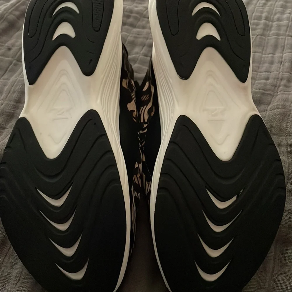 APL Leopard Print Athletic Sneakers in Black and Tan